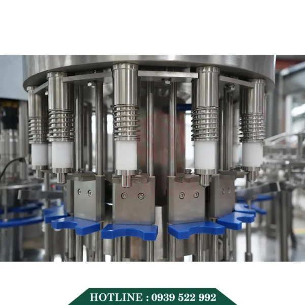 Dây Chuyền Sản Xuất Nước Uống Đóng Chai 24-24-8 19 day chuyen san xuat nuoc uong dong cha 8 copy