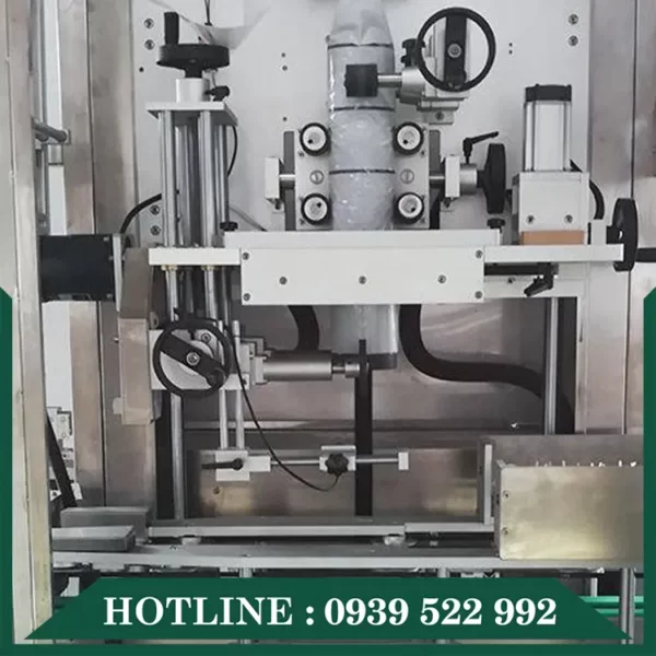 Máy Phóng Nhãn Màng Co Thân Chai 9 may phong nhan mang co than chai 4