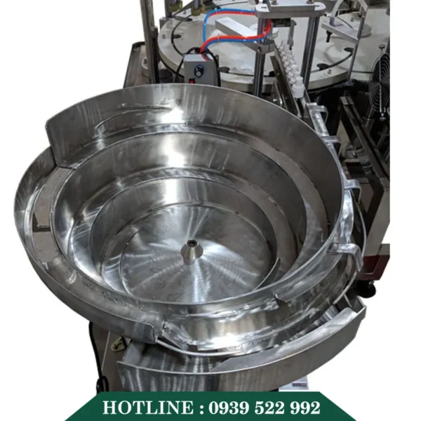 may chiet rot va siet nap chai tinh dau 3 in 1 tu dong dang xoay 1